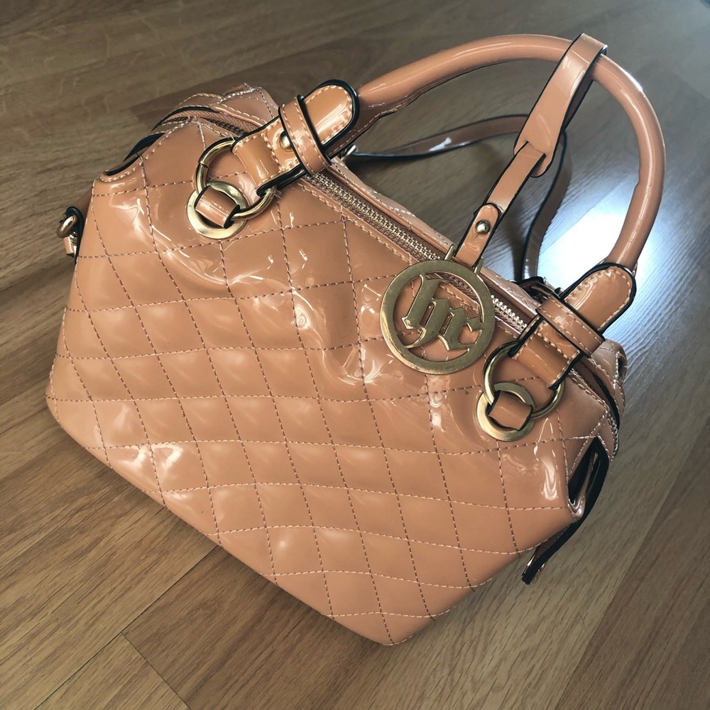 Shiny vintage pink tone bag